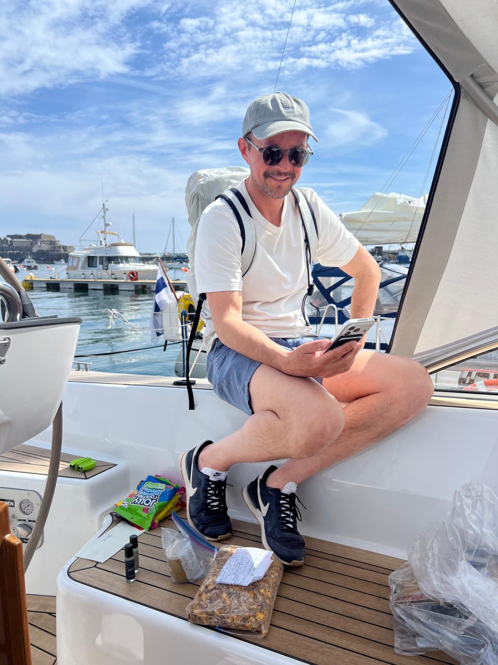 Damian with Britt's care package in Guernsey