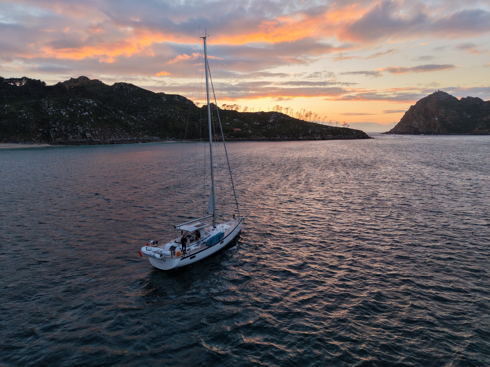 Stani at anchor off Islas Cíes at sunset
