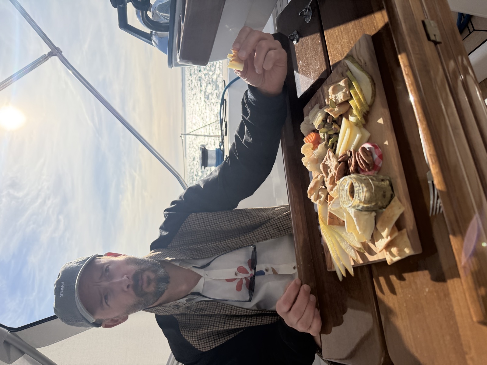 Paddy with the cheese board in the cockpit