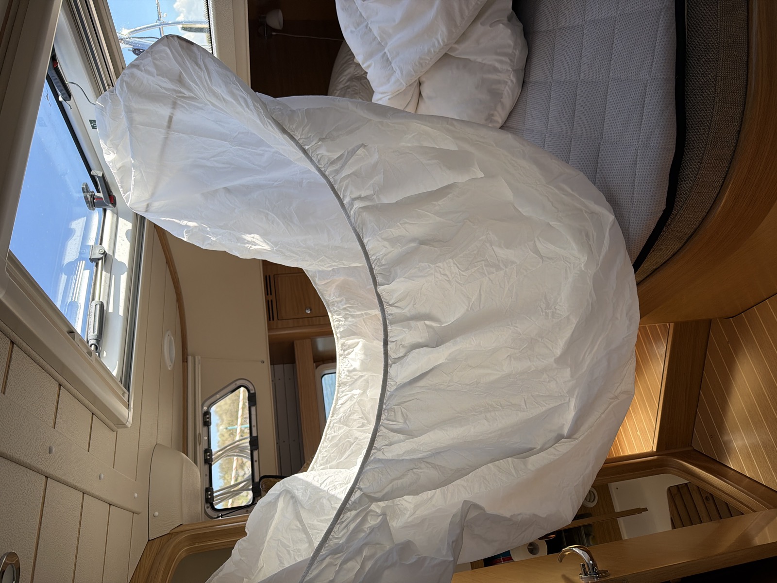 Sheets billowing in the cabin