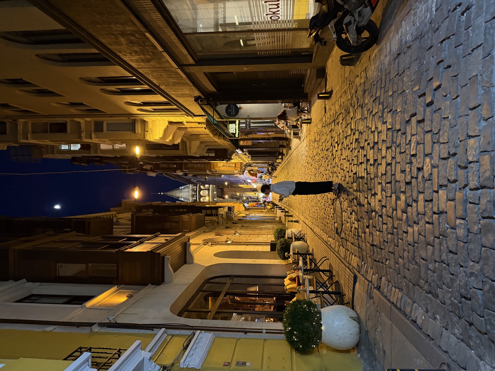 A cobblestone street in Istanbul at night