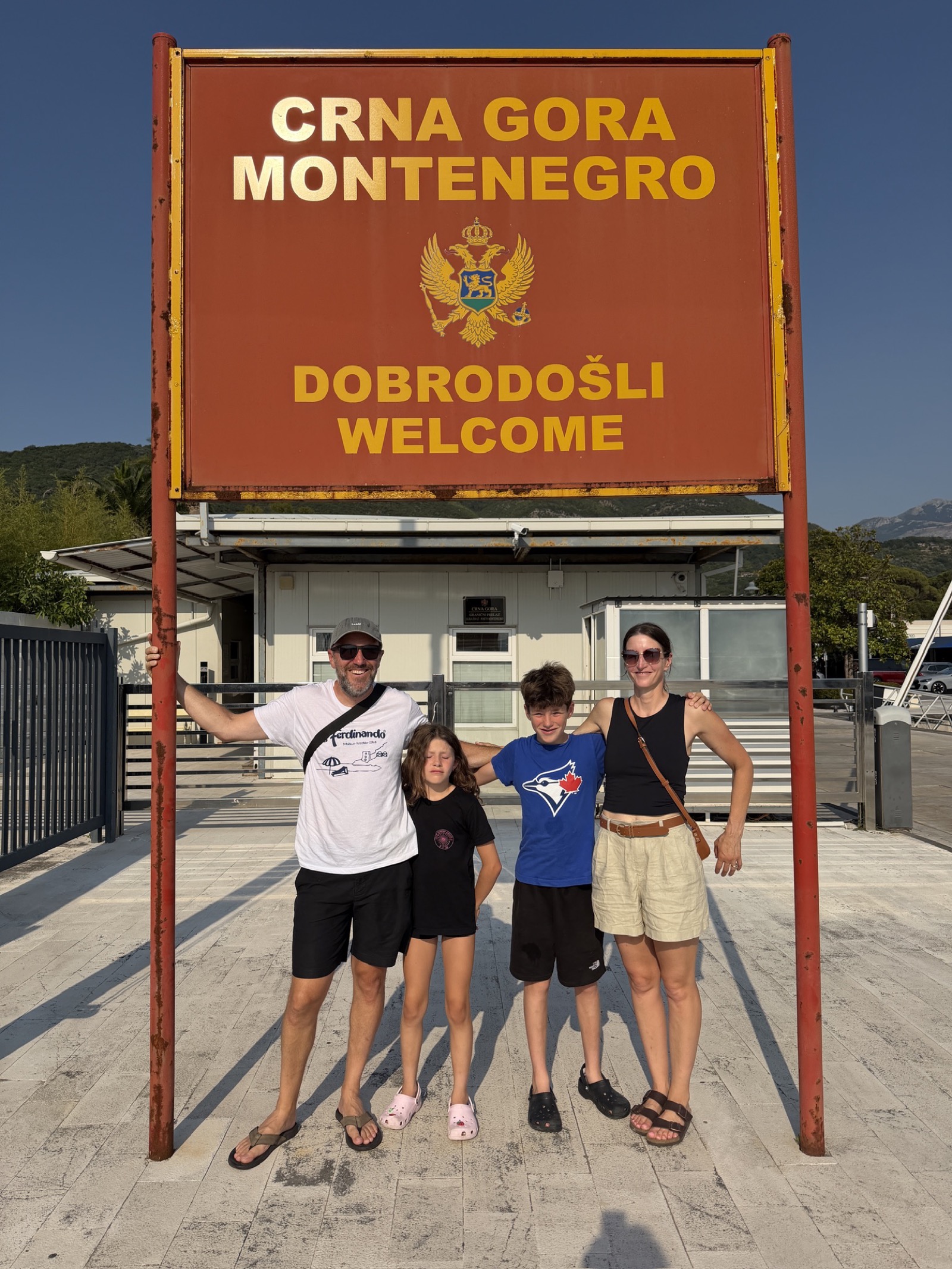 The Gerhardt/Petersens at the Montenegro border sign