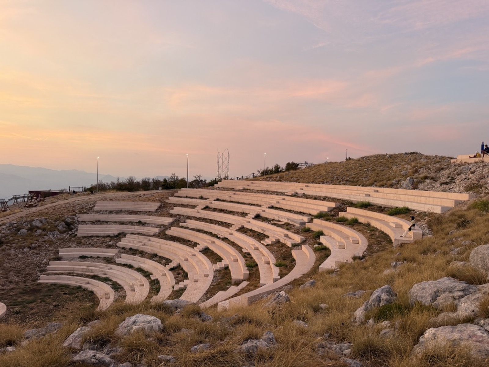 Amphitheater seating on the ridge at sunset