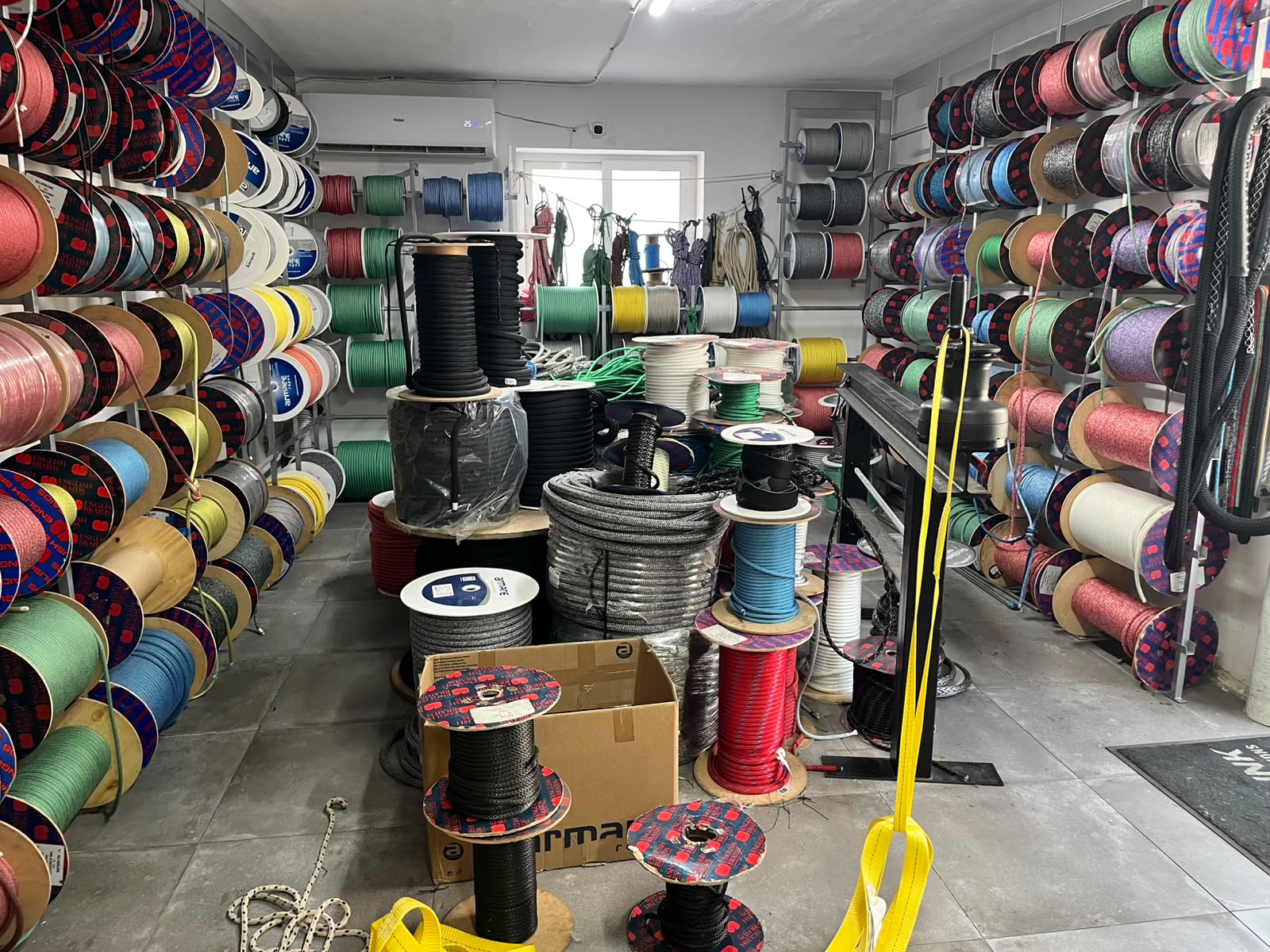 Inside ProLink Rigging's shop in Malta, walls and floor packed with spools of colourful rope